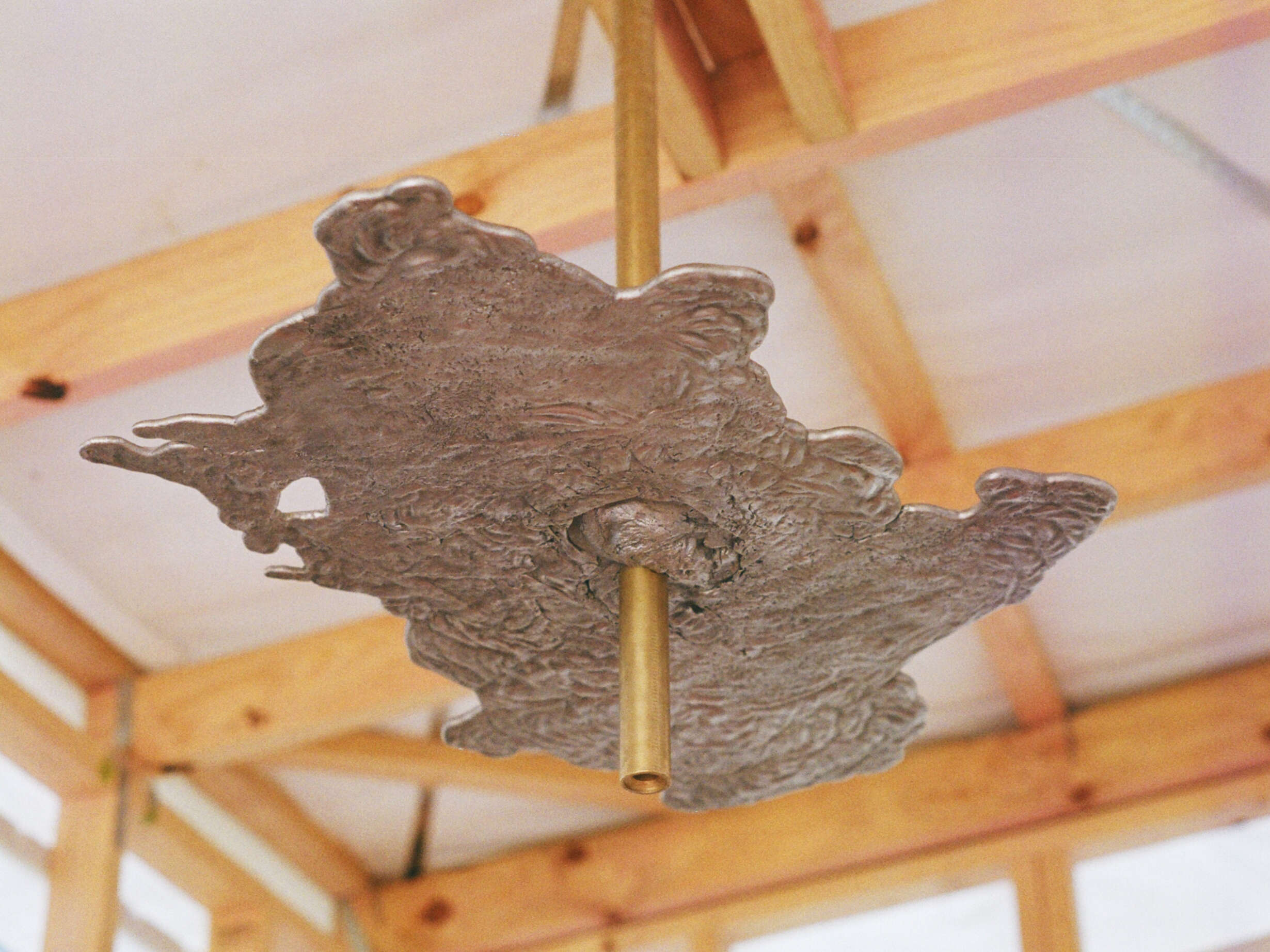 Main light In hut - cast aluminium suspended on bronze rod