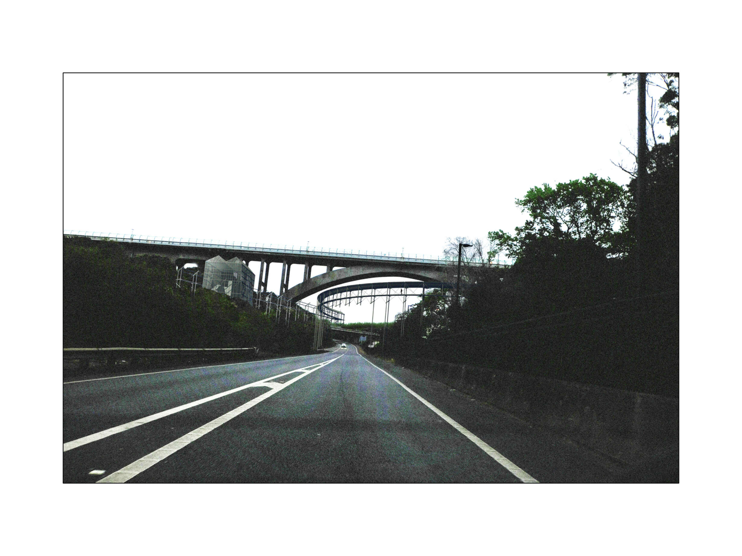 Motorist’s perspective looking south, underneath the interlocking bridges.