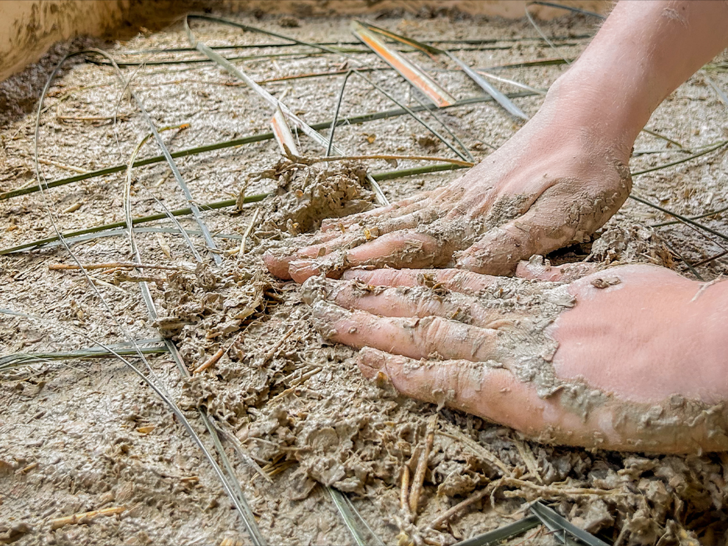 Creating the earthen site model using clay from Hiwiroa.